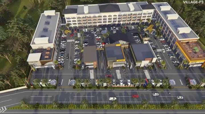 Aerial view of P-3 Village, a commercial property in Mohali, featuring retail shops, office spaces, and ample parking near Chandigarh.